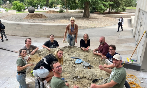 The team removing the rock matrix outside the Museum before pushing it into the Museum’s loading dock.