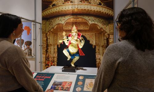 Guests looking at exhibit