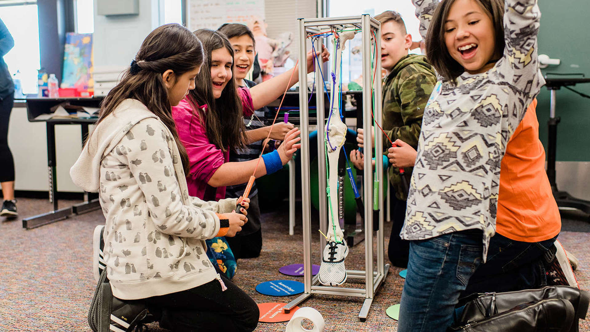 Students complete a challenge in Wonder Workshop "Body Systems in Motion"