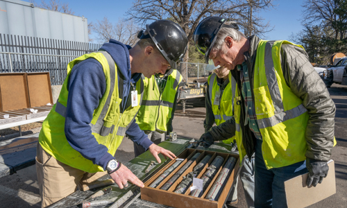 Earth Sciences Curator Dr. James Hagadorn and Research Associate Dr. Bob Raynolds examine scientific cores in the parking lot at the Denver Museum of Nature & Science in January, 2025.