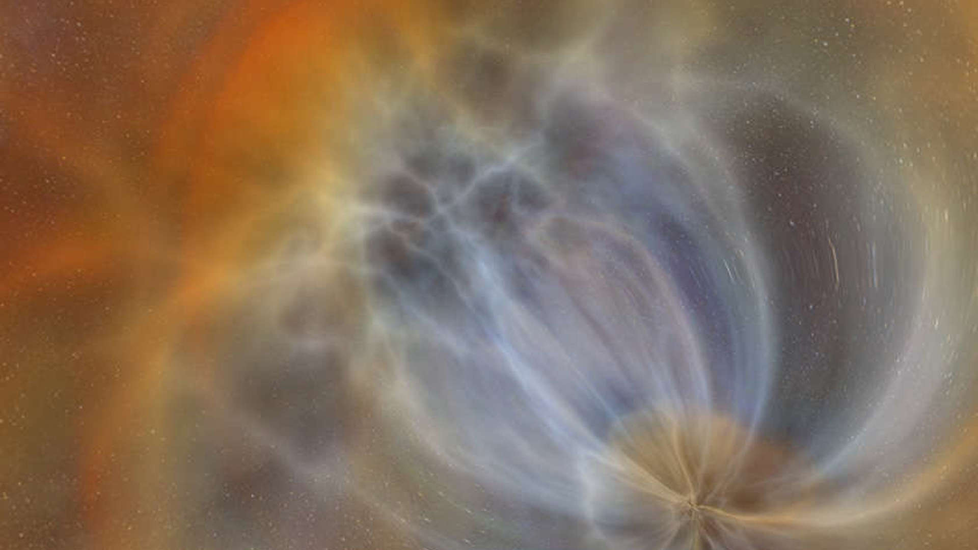 Colorful image from space with orange and blue swirls in a flower shape